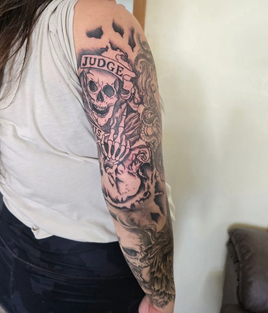 Custom sleeve tattoo artwork by Mike Kuntz - House of Pain Tattoos Moose Jaw Saskatchewan professional blackwork and realism