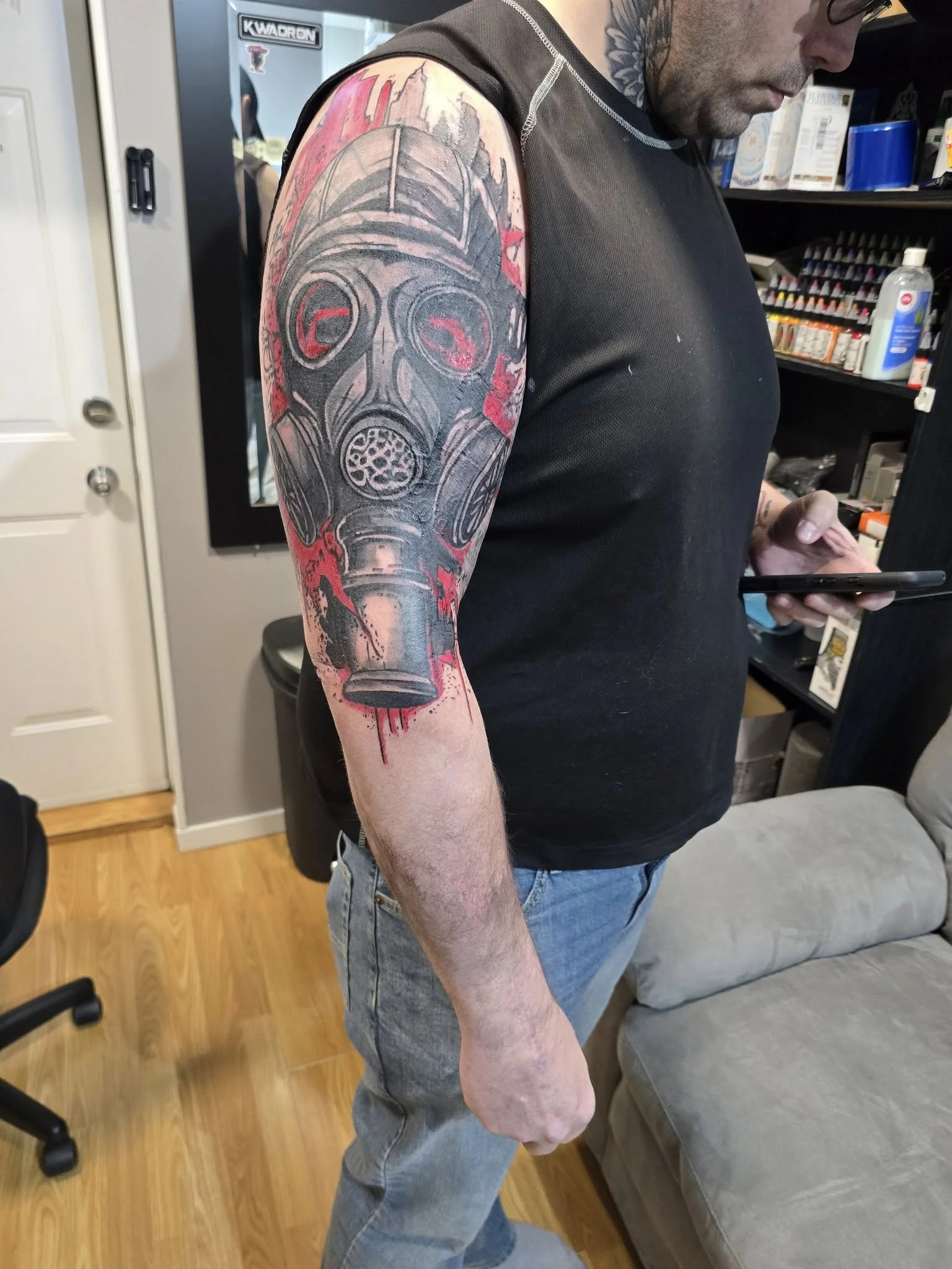 Gas mask with flowers blackwork tattoo - Mike Kuntz House of Pain Moose Jaw