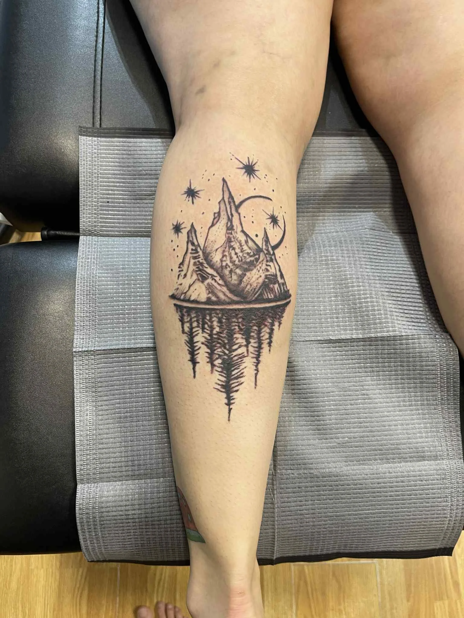 Compass geometric calf tattoo - Travel inspired tattoo Moose Jaw Saskatchewan