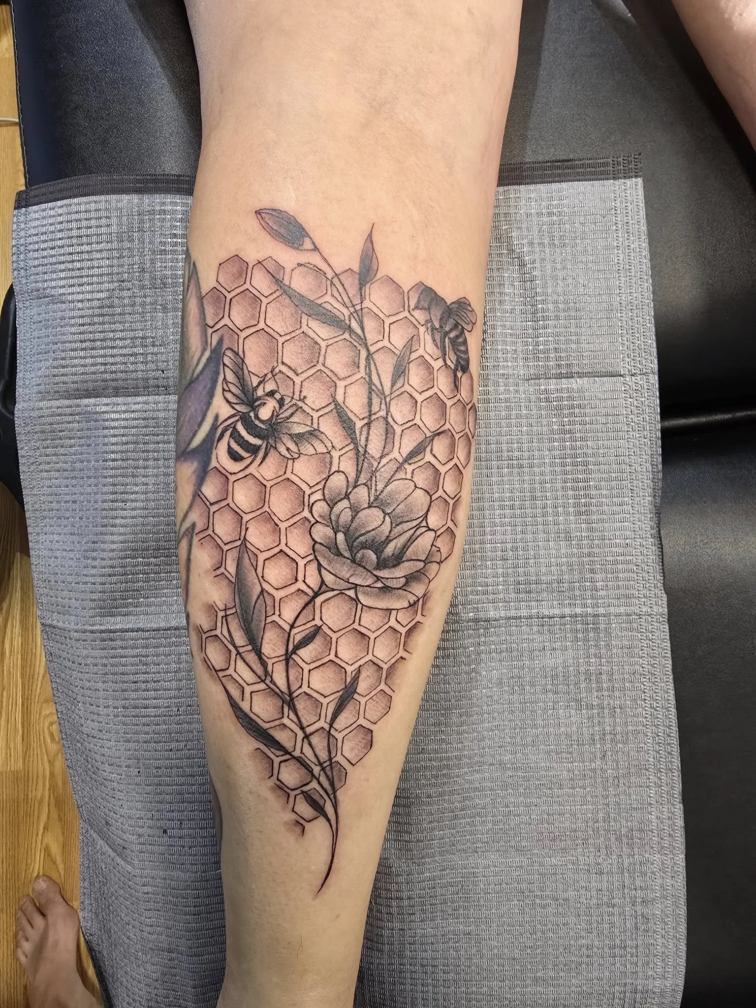 Detailed skull and flower sleeve tattoo - Large scale custom sleeve Moose Jaw